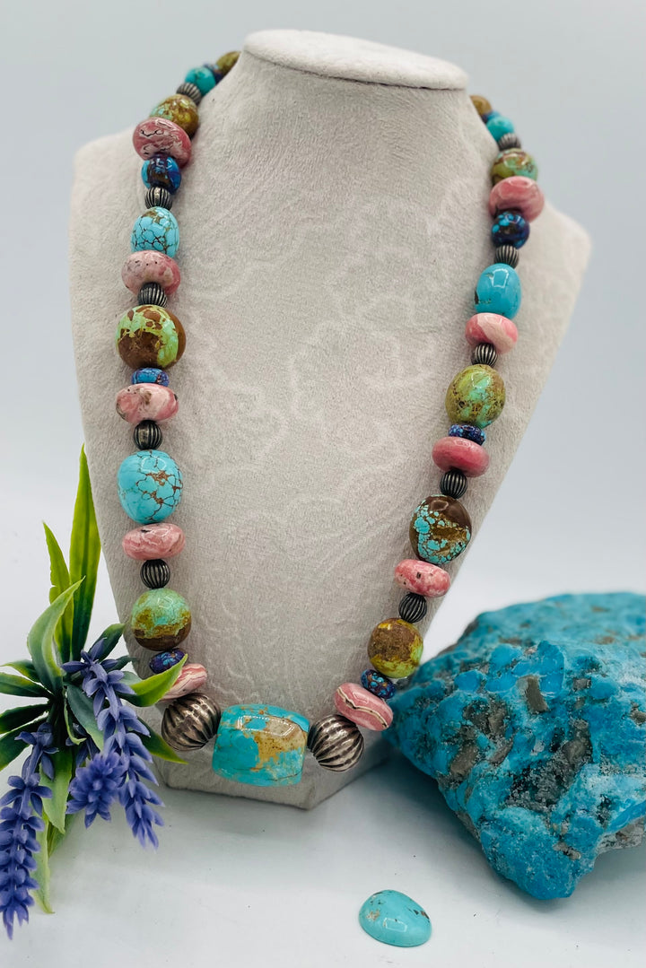 Beaded necklace featuring #8 turquoise, Kingman turquoise, purple Mojave turquoise, Rhodochrosite, and sterling silver beads. Available only from Rockstar Cowgirl online or  store in Cody, Wyoming.