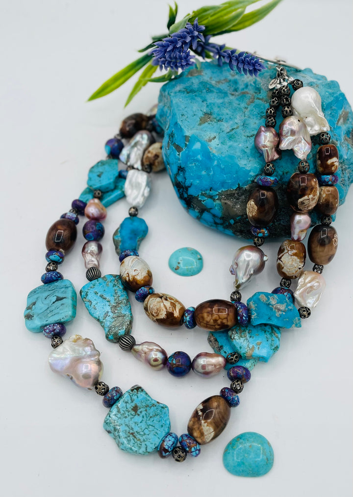 Beaded 3 strand necklace featuring Kingman turquoise slices, crazy lace agate, natural luster baroque pearls, and sterling silver beads. Available only from Rockstar Cowgirl online or in store in Cody, Wyoming.