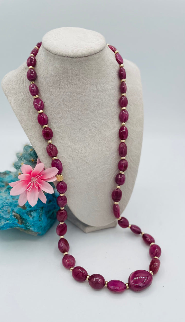 Beaded necklace featuring natural ruby nuggets and 14K gold beads. Available only from Rockstar Cowgirl online or in store in Cody, Wyoming.