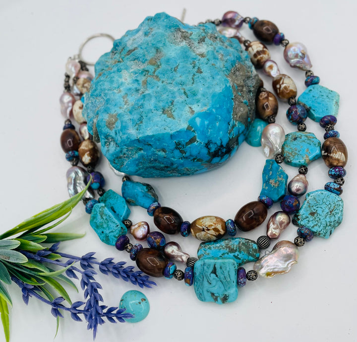Beaded 3 strand necklace featuring Kingman turquoise slices, crazy lace agate, natural luster baroque pearls, and sterling silver beads. Available only from Rockstar Cowgirl online or in store in Cody, Wyoming.