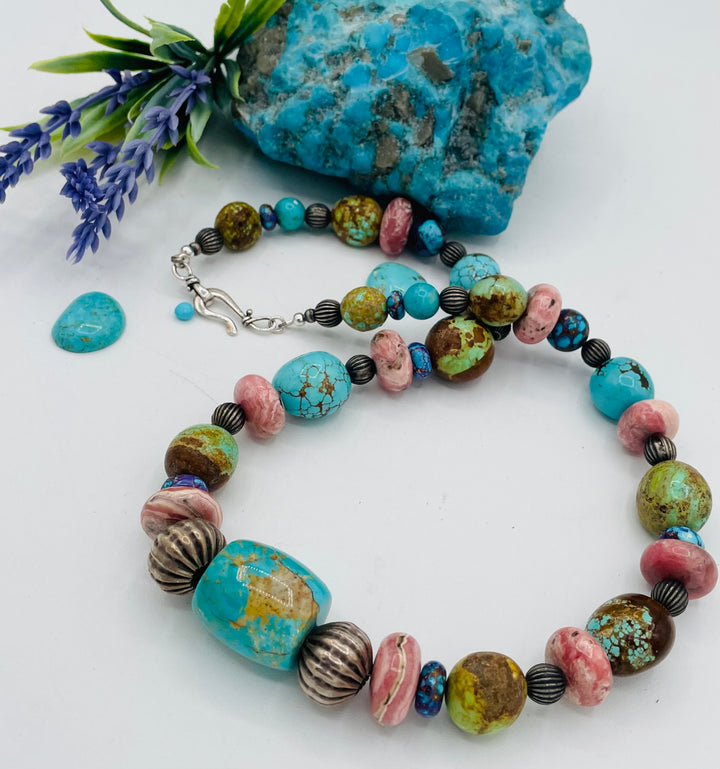 Beaded necklace featuring #8 turquoise, Kingman turquoise, purple Mojave turquoise, Rhodochrosite, and sterling silver beads. Available only from Rockstar Cowgirl online or  store in Cody, Wyoming.