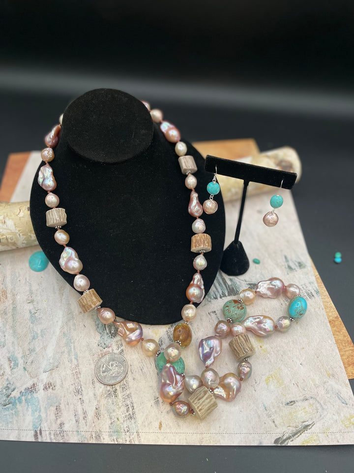 Silk knotted baroque and Edison pearl, Kingman turquoise, and deer antler necklace with matching earrings. Available only from Rockstar Cowgirl online or in store in Cody, Wyoming.