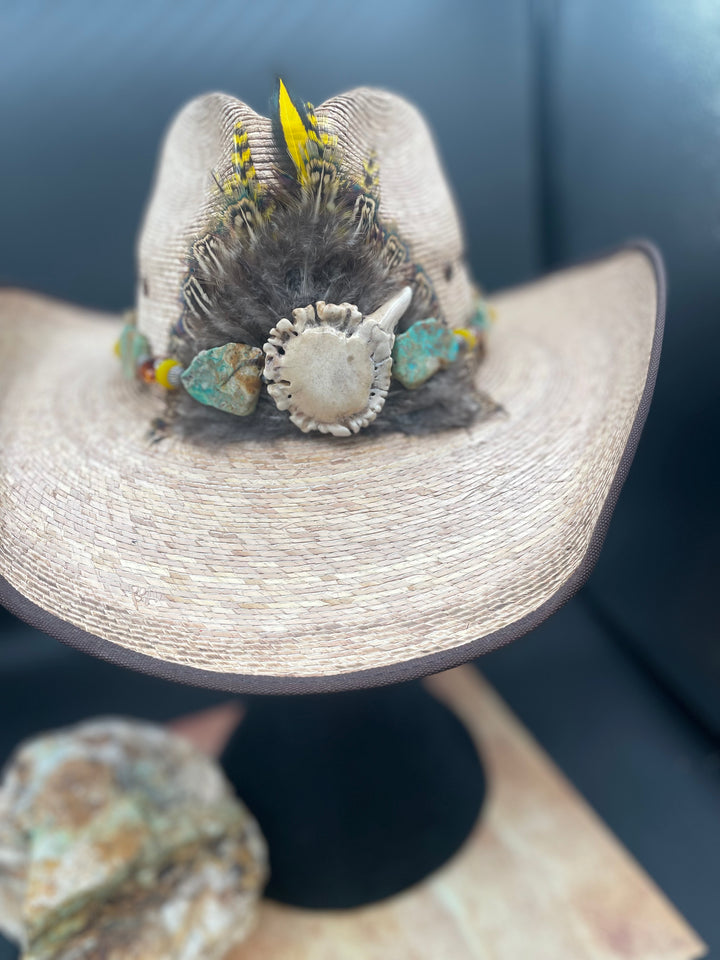 Close up of the handmade feather burst and polished antler crown. The feather extend slightly above the crown. Available only with Rockstar Cowgirl online or in store. One of a kind item. Hat not included.