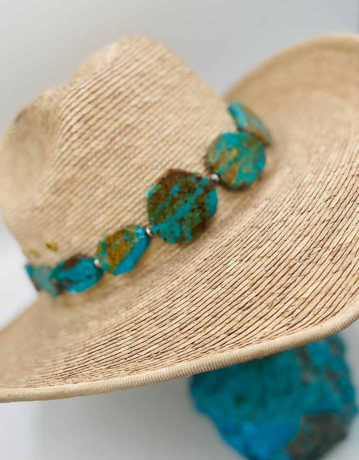 Adjustable beaded hatband featuring Kingman turquoise, and sterling silver beads finished with deer lace in the back. Available only from Rockstar Cowgirl online or in store in Cody, Wyoming.