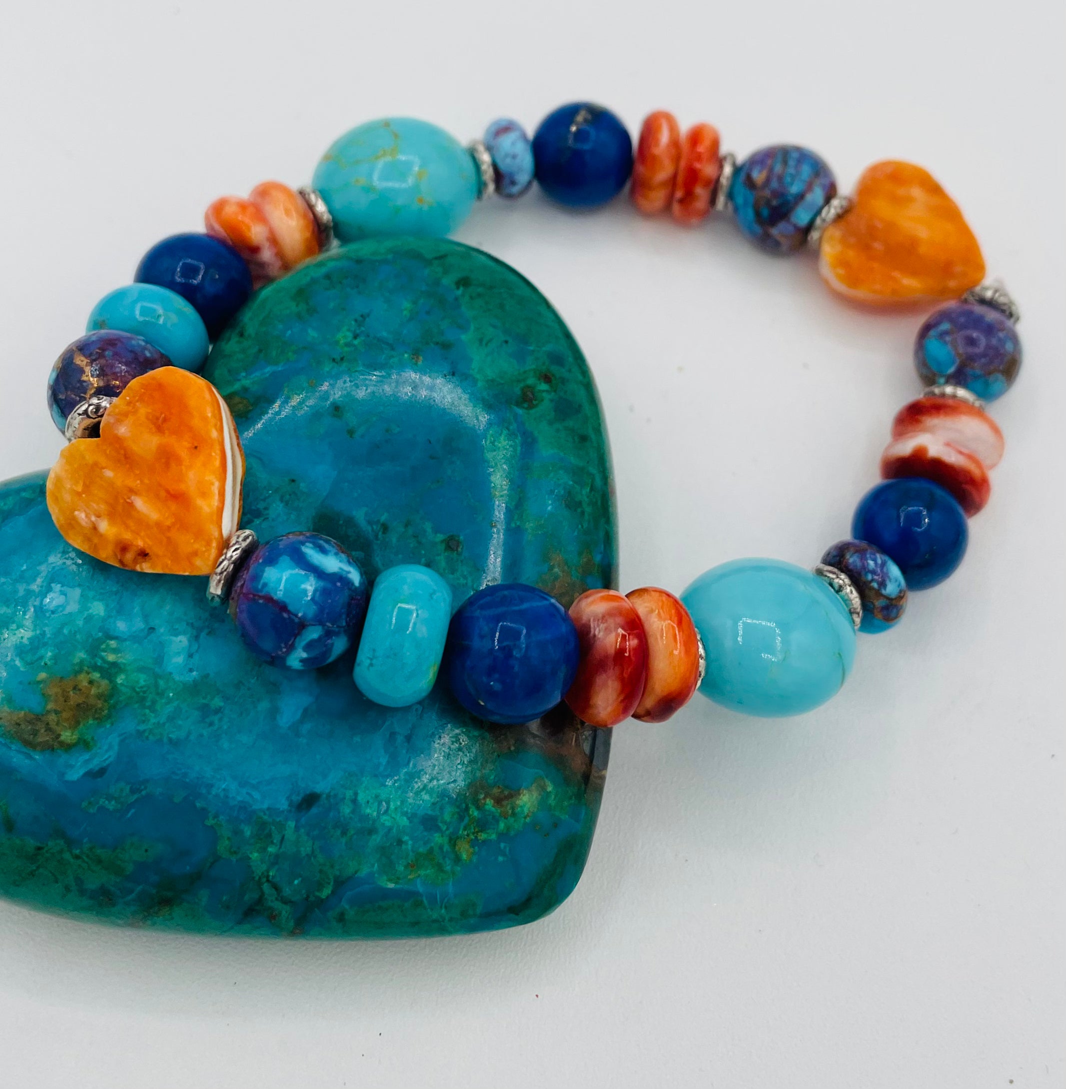 Stretch bracelets featuring spiney oyster hearts Kingman turquoise, purple Mojave turquoise, lapis, and sterling silver beads. Available only from Rockstar Cowgirl online or in store in Cody, Wyoming.