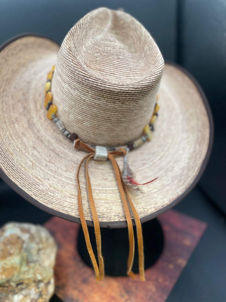 Close up of the back of the hatband with the deer lace, feathers, and antler slide bead. Available only from  Rockstar Cowgirl online or in store in Cody, Wyoming.