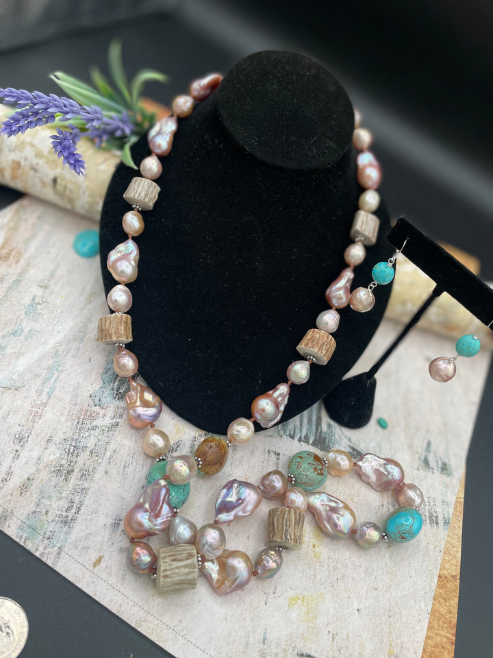 Showcasing the drape and flexibility of the silk knotting on this baroque and Edison natural luster pearl, Kingman turquoise, and deer antler necklace with matching earrings. Available only from Rockstar Cowgirl online or in store in Cody, Wyoming.