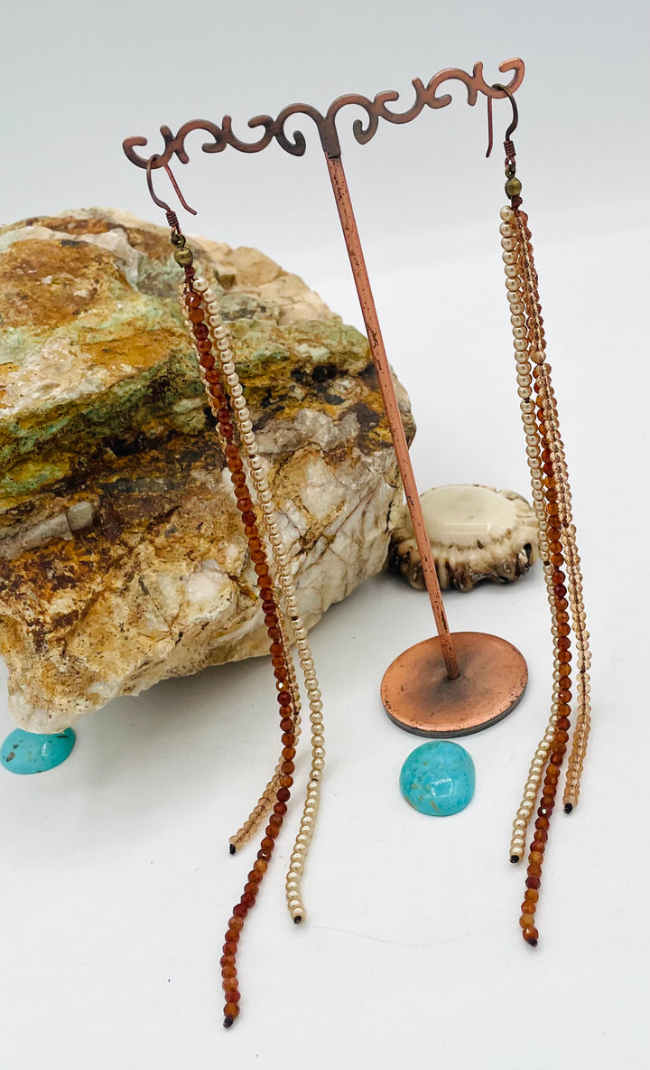 Silk knotted earrings featuring hessonite garnet, vintage glass pearls, and gold glass crystals. Available only from Rockstar Cowgirl online or in store in Cody, Wyoming.