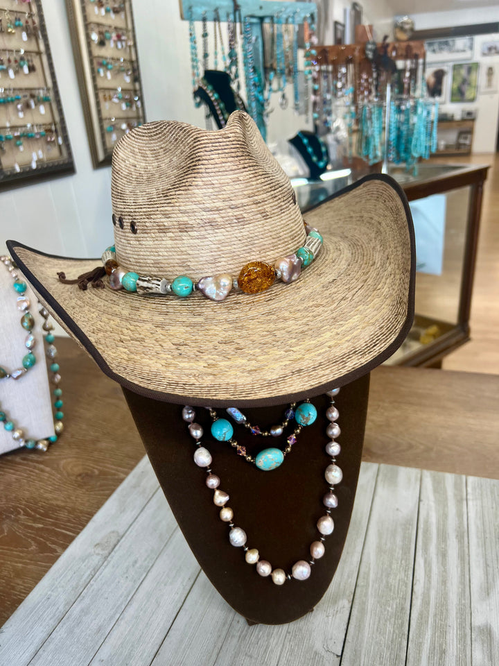 Hatband featuring Baltic amber, baroque natural luster pearls, deer antler, and sterling silver beads. Available only from Rockstar Cowgirl online or in store in Cody, Wyoming.