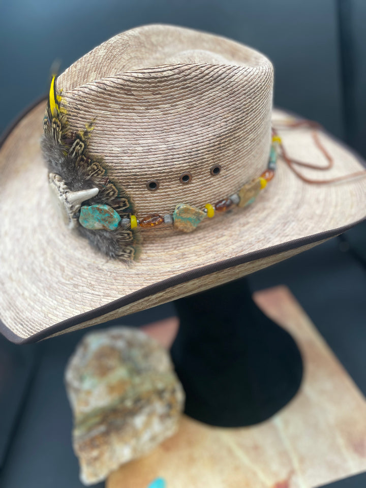 Side view of the hatband featuring the Kingman turquoise, Baltic amber, yellow African yellow glass and sterling silver beads.
