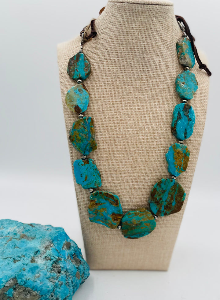 Adjustable beaded hatband featuring Kingman turquoise, and sterling silver beads finished with deer lace in the back. Available only from Rockstar Cowgirl online or in store in Cody, Wyoming.