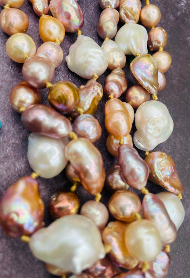 Close up of the natural luster, shapes, and colors of the baroque pearls in this 3 strand silk knotted twist or torsade necklace set. Available only from Rockstar Cowgirl online or in store in Cody, Wyoming.