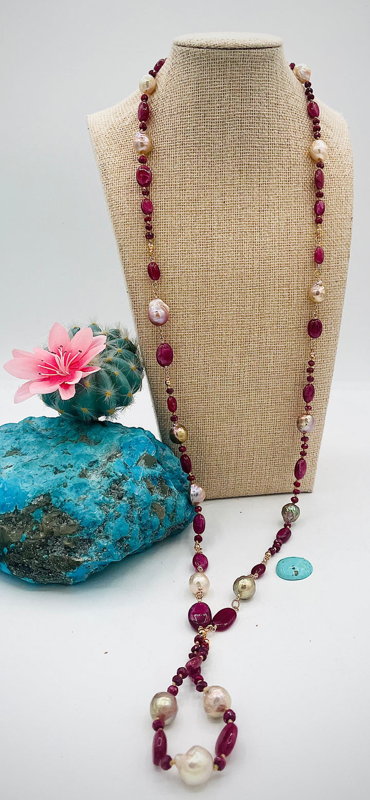 Silk knotted treasure necklace featuring rubies and natural luster Edison pearls. Available only from Rockstar Cowgirl online or in store in Cody, Wyoming.