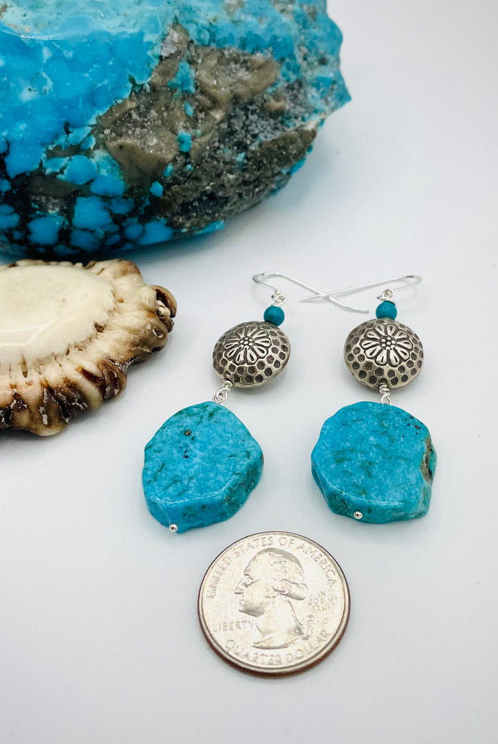 Handmade earrings featuring Kingman turquoise slabs, Karen Hill tribe sterling silver beads, and turquoise rounds. U.S. quarter for size reference. Available only from Rockstar Cowgirl online or in store in Cody,Wyoming.