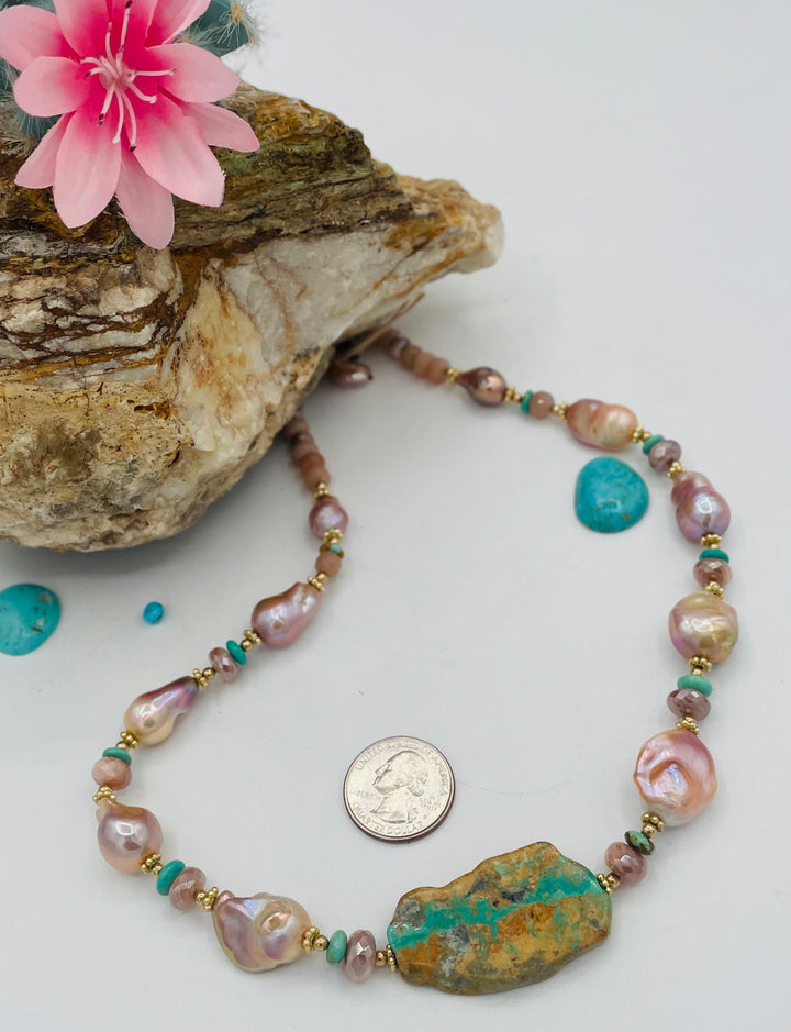 Beaded necklace featuring natural luster pearls, Kingman turquoise, peach moonstone, and gold details. U.S. quarter for size reference. Available only from Rockstar Cowgirl online or in store in Cody, Wyoming.