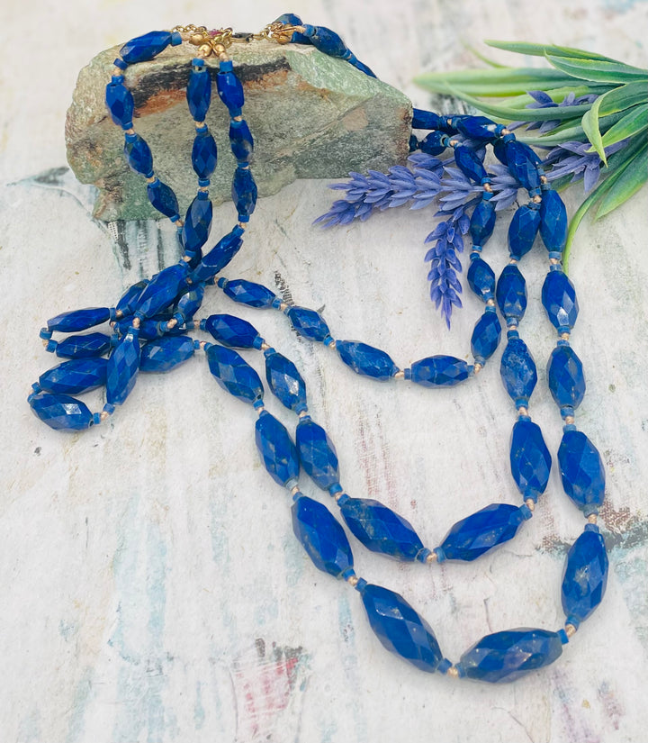 3 strand nested Afghan lapis beads silk knotted on gold silk necklace. Available only from Rockstar Cowgirl online or in store in Cody, Wyoming.