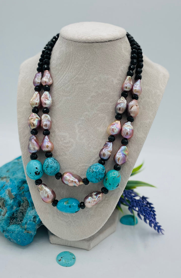 Beaded 2 strand necklace featuring spinel, baroque natural luster pearls, and Kingman turquoise nuggets. Available only from Rockstar Cowgirl online or in store in Cody, Wyoming.