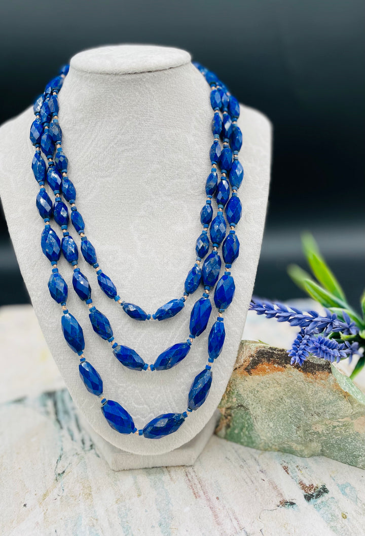 3 strand nested Afghan lapis beads silk knotted on gold silk necklace. Available only from Rockstar Cowgirl online or in store in Cody, Wyoming.