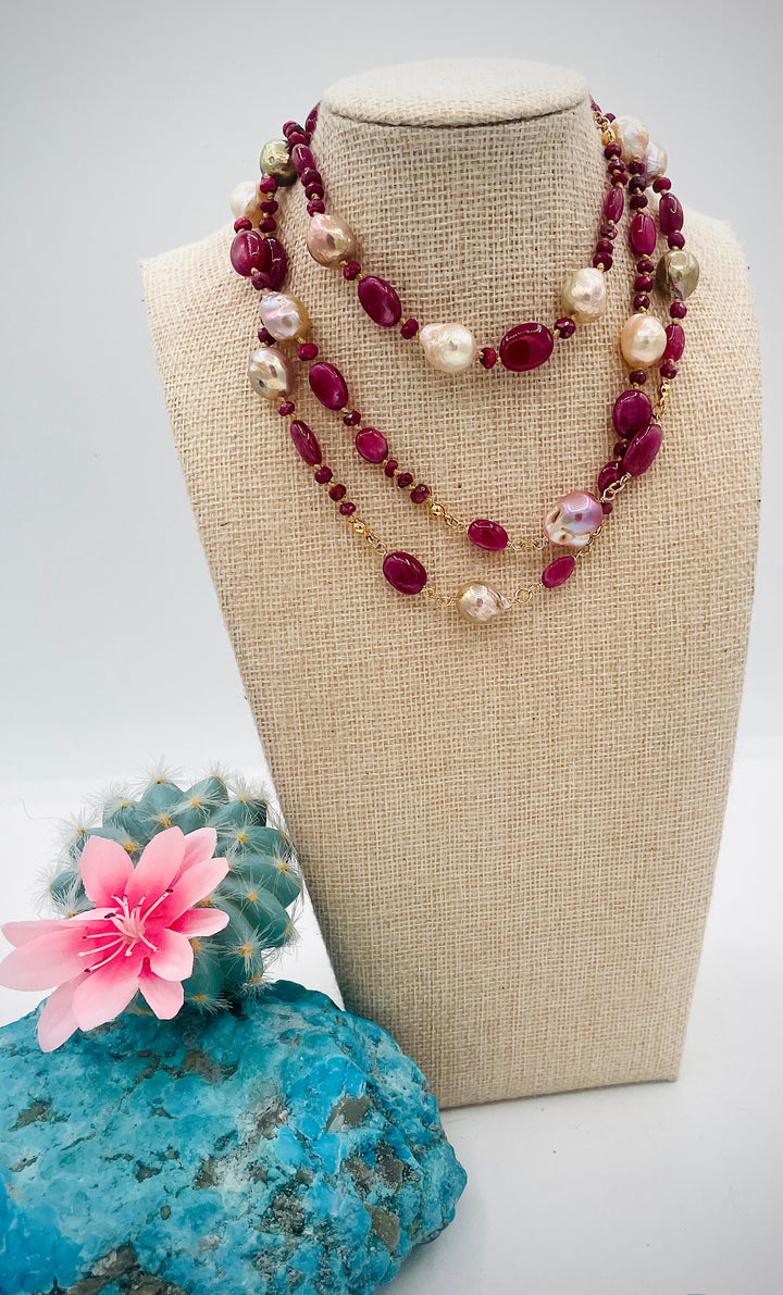 Silk knotted treasure necklace featuring rubies and natural luster Edison pearls. Available only from Rockstar Cowgirl online or in store in Cody, Wyoming.