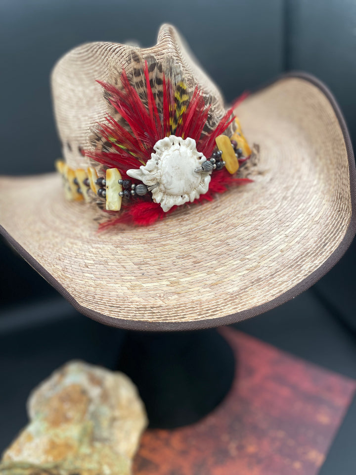 Close up of the red feather burst and antler crown on the front of the hatband. Available only from Rockstar Cowgirl online or in store in Cody, Wyoming.
