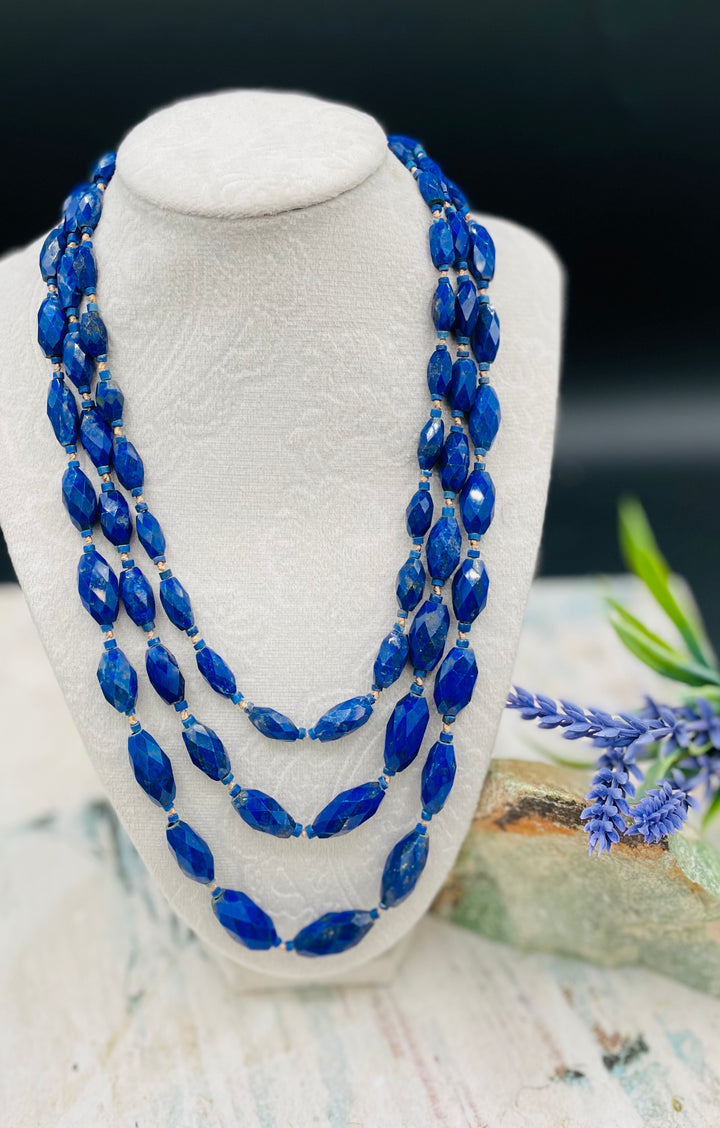3 strand nested Afghan lapis beads silk knotted on gold silk necklace. Available only from Rockstar Cowgirl online or in store in Cody, Wyoming.
