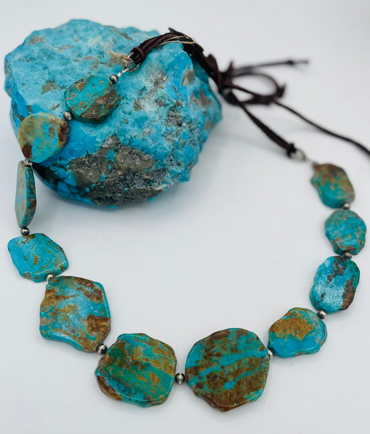 Adjustable beaded hatband featuring Kingman turquoise, and sterling silver beads finished with deer lace in the back. Available only from Rockstar Cowgirl online or in store in Cody, Wyoming.