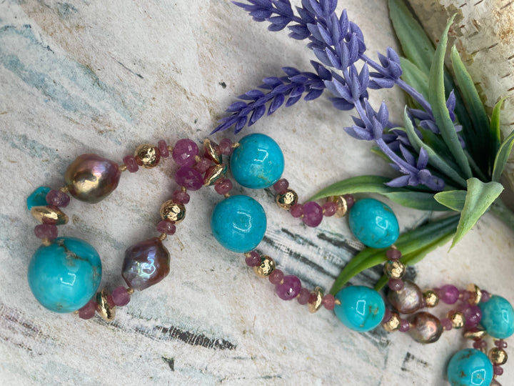 Close up of the matrix in the Kingman turquoise nuggets, and the colors and textures in the rubies, Edison pearls, and hammered 14k beads. Available only from Rockstar Cowgirl online or in store in Cody, Wyoming.