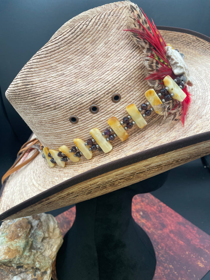 Hat band with feathers, antler crown, Baltic amber, garnet, sterling silver beads and finished with feathers on the back, deer lace, and antler slide bead. Available only from Rockstar Cowgirl online or in store in Cody, Wyoming.