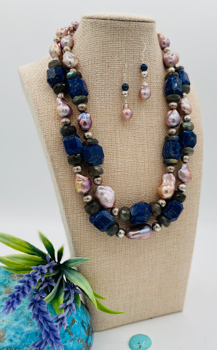 Beaded double stranded necklace featuring lapis, natural luster baroque pearls, labradorite, and sterling silver beads. Matching earrings included. Available only from Rockstar Cowgirl online or in store in Cody, Wyoming.