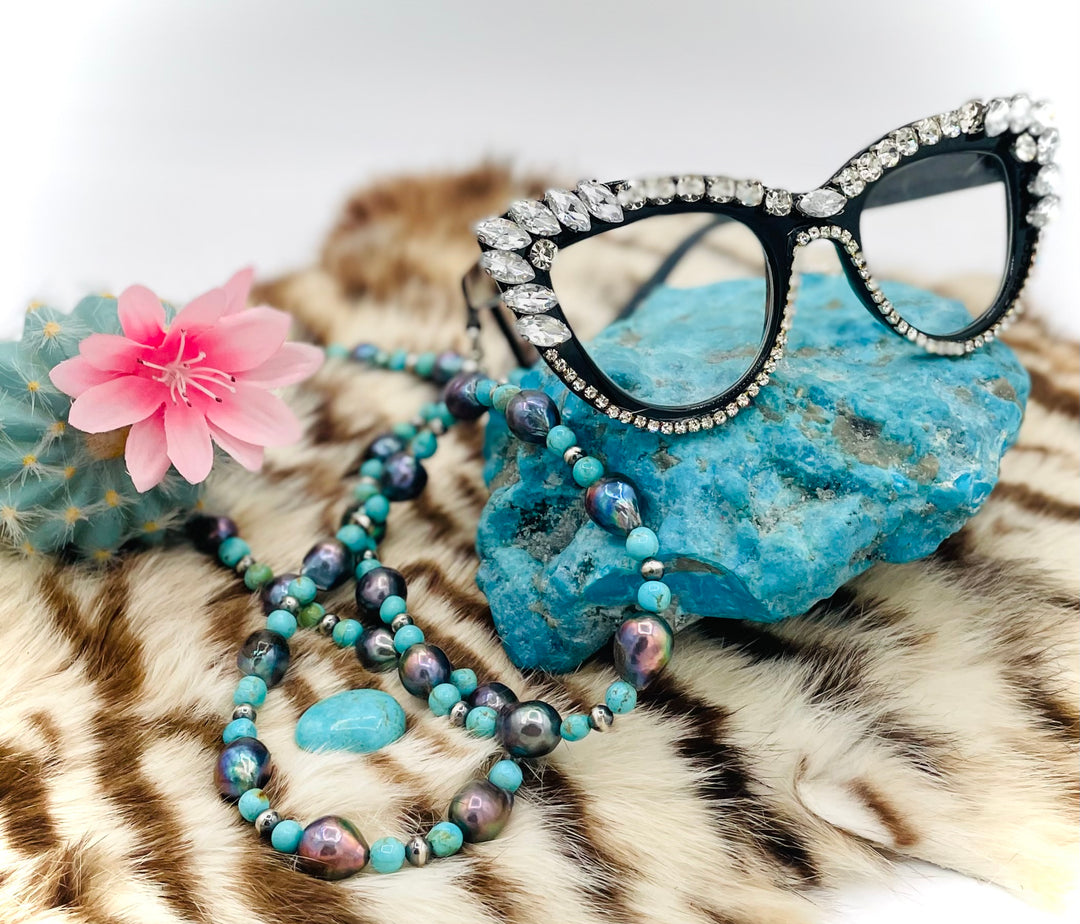 Beaded invention necklace featuring Kingman turquoise, peacock pearls, sterling silver beads, sterling silver swivel lobsters, eyeglass loops, and cell phone case attachment bracket. Available only from Rockstar Cowgirl online or in store in Cody, Wyoming. 