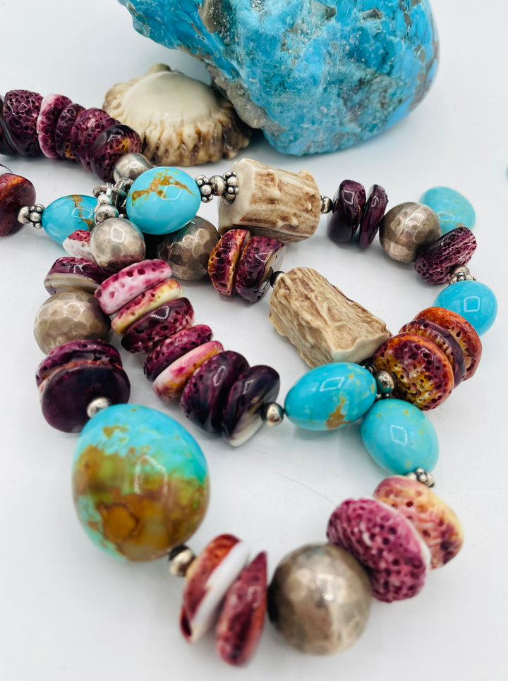 Beaded necklace featuring Antler beads, purple spiney oyster, Kingman turquoise nuggets, and sterling silver beads. Available only from Rockstar Cowgirl online or in store in Cody, Wyoming.