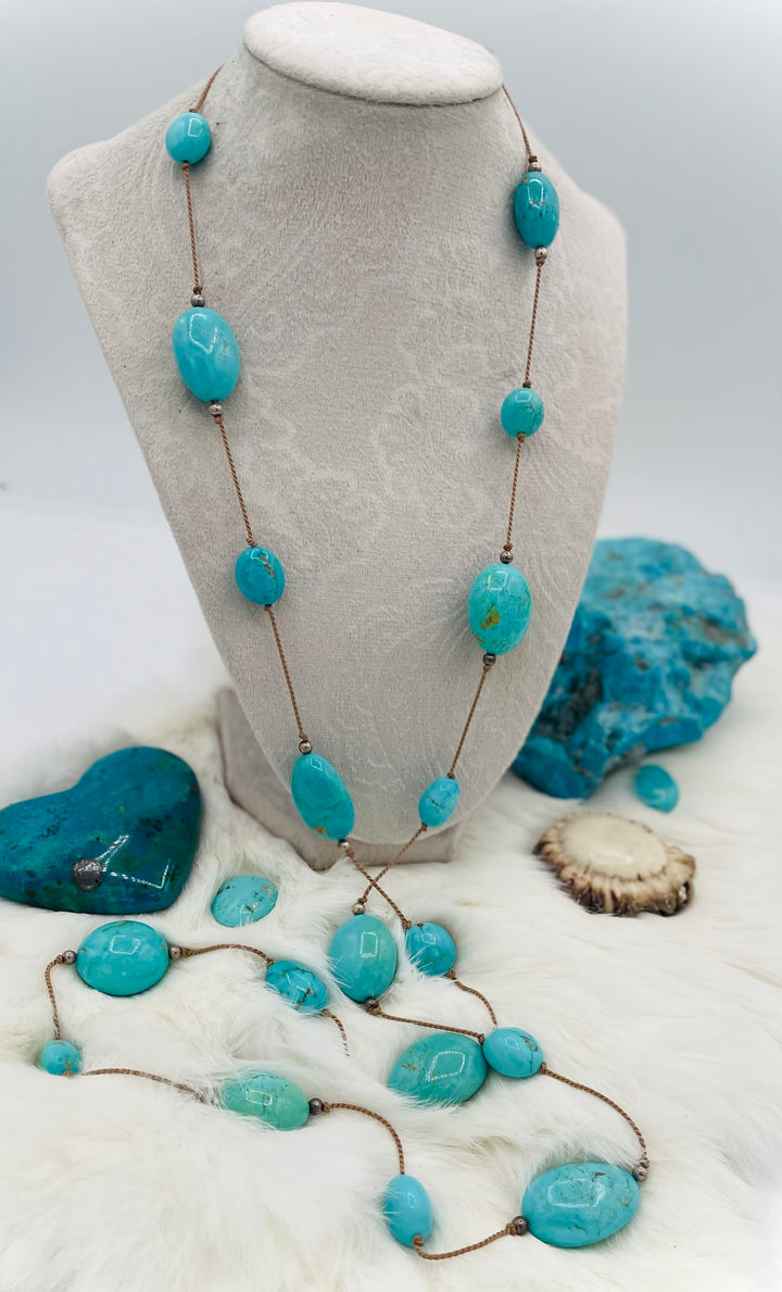 Silk knotted necklace featuring Kingman turquoise nuggets and sterling silver rounds on silk cord. Available only from Rockstar Cowgirl online or in store in Cody, Wyoming.