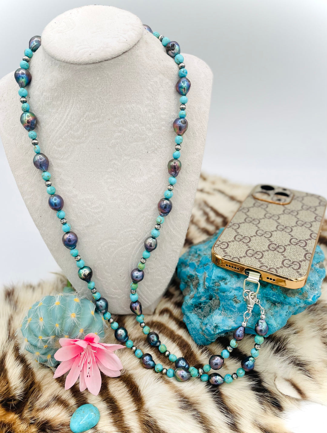 Beaded invention necklace featuring Kingman turquoise, peacock pearls, sterling silver beads, sterling silver swivel lobsters, eyeglass loops, and cell phone case attachment bracket. Available only from Rockstar Cowgirl online or in store in Cody, Wyoming. 