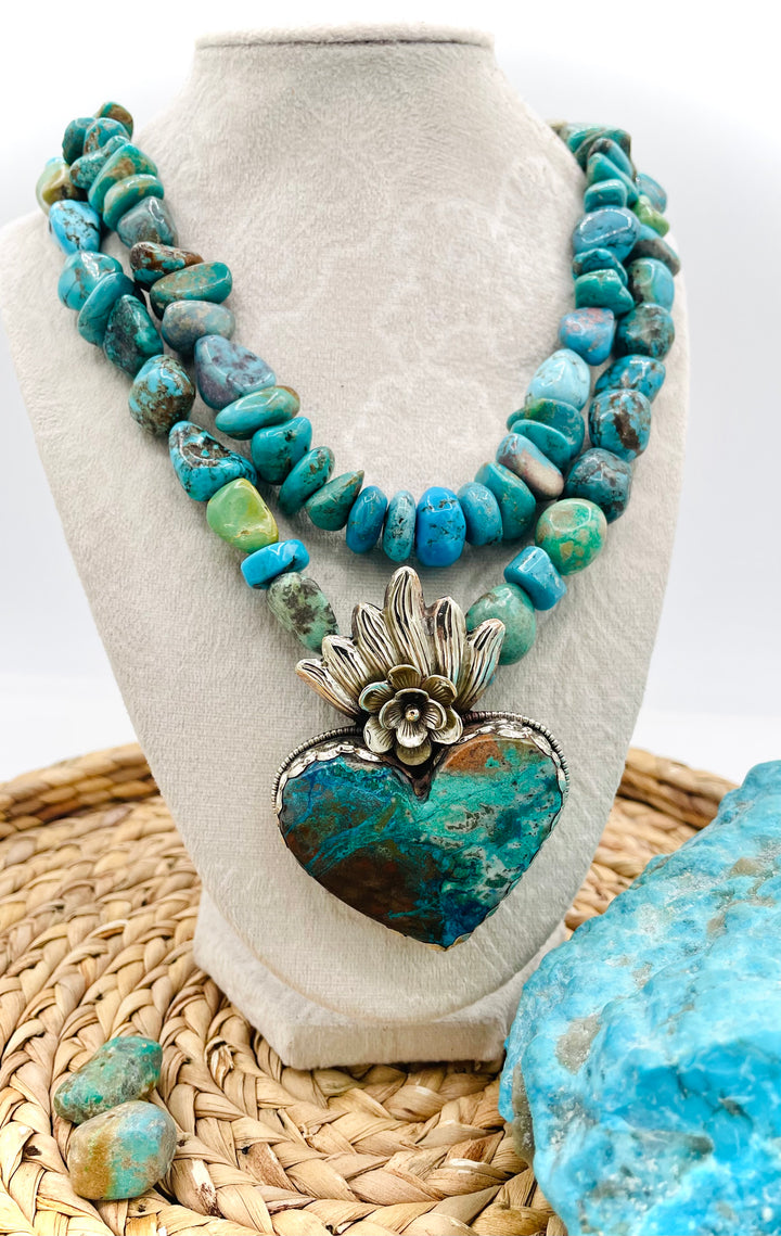Chunky beaded turquoise necklace with Tibetan silver and chrysocolla pendent. Available only from Rockstar Cowgirl online or in Cody, Wyoming. 