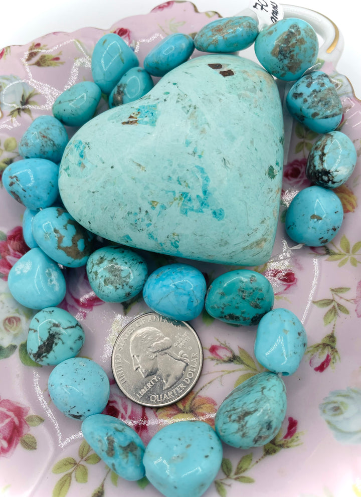 Campitos turquoise nuggets 16 inch bead strand. U.S. quarter for size reference. Available only from Rockstar Cowgirl online or in store in Cody, Wyoming.