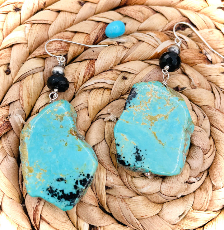 Beaded three strand necklace featuring Kingman turquoise, onyx, spinel, sterling silver, and finished with deer lace and slide bead. Includes matching earrings. Available only from Rockstar Cowgirl online or in store in Cody, Wyoming.