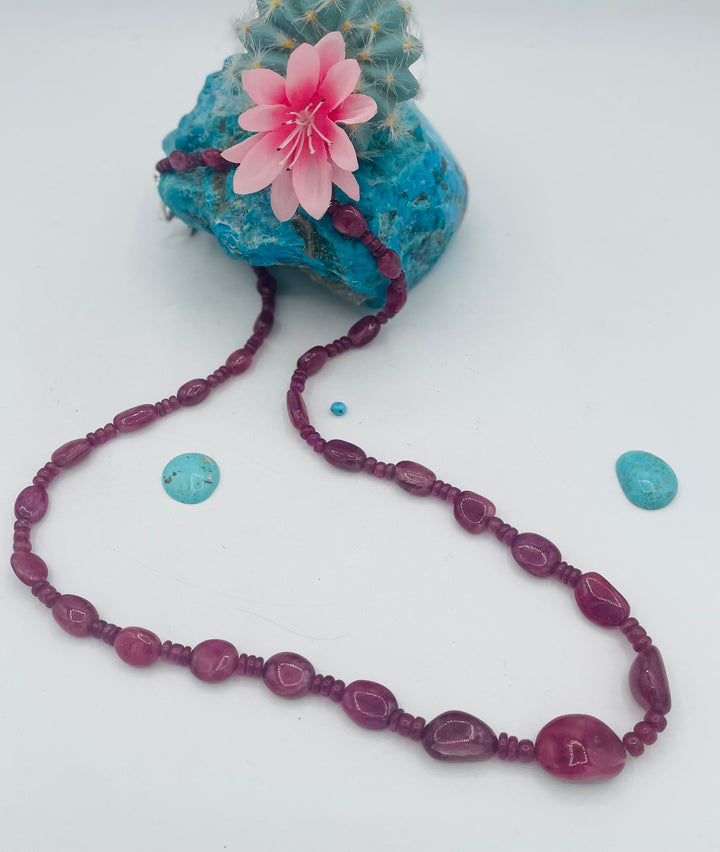Long beaded necklace featuring natura ruby nuggets and rondelles. Available only from Rockstar Cowgirl online or in store in Cody, Wy.