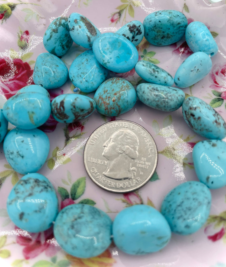 Campitos turquoise nuggets 16 inch bead strand. U.S. quarter for size reference. Available only from Rockstar Cowgirl online or in store in Cody, Wyoming.
