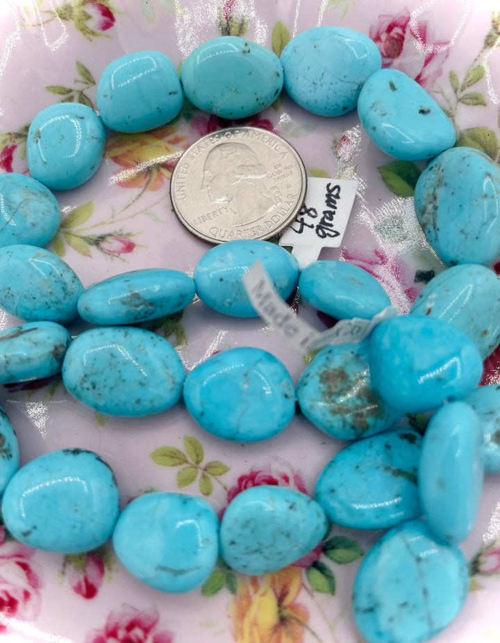 Campitos turquoise nuggets 16 inch bead strand. U.S. quarter for size reference. Available only from Rockstar Cowgirl online or in store in Cody, Wyoming.