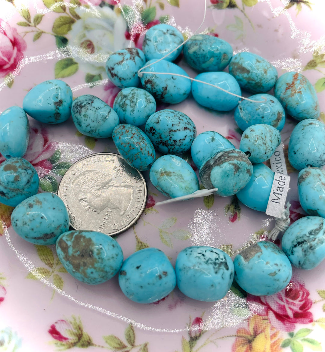 Campitos turquoise nuggets 16 inch bead strand. U.S. quarter for size reference. Available only from Rockstar Cowgirl online or in store in Cody, Wyoming.