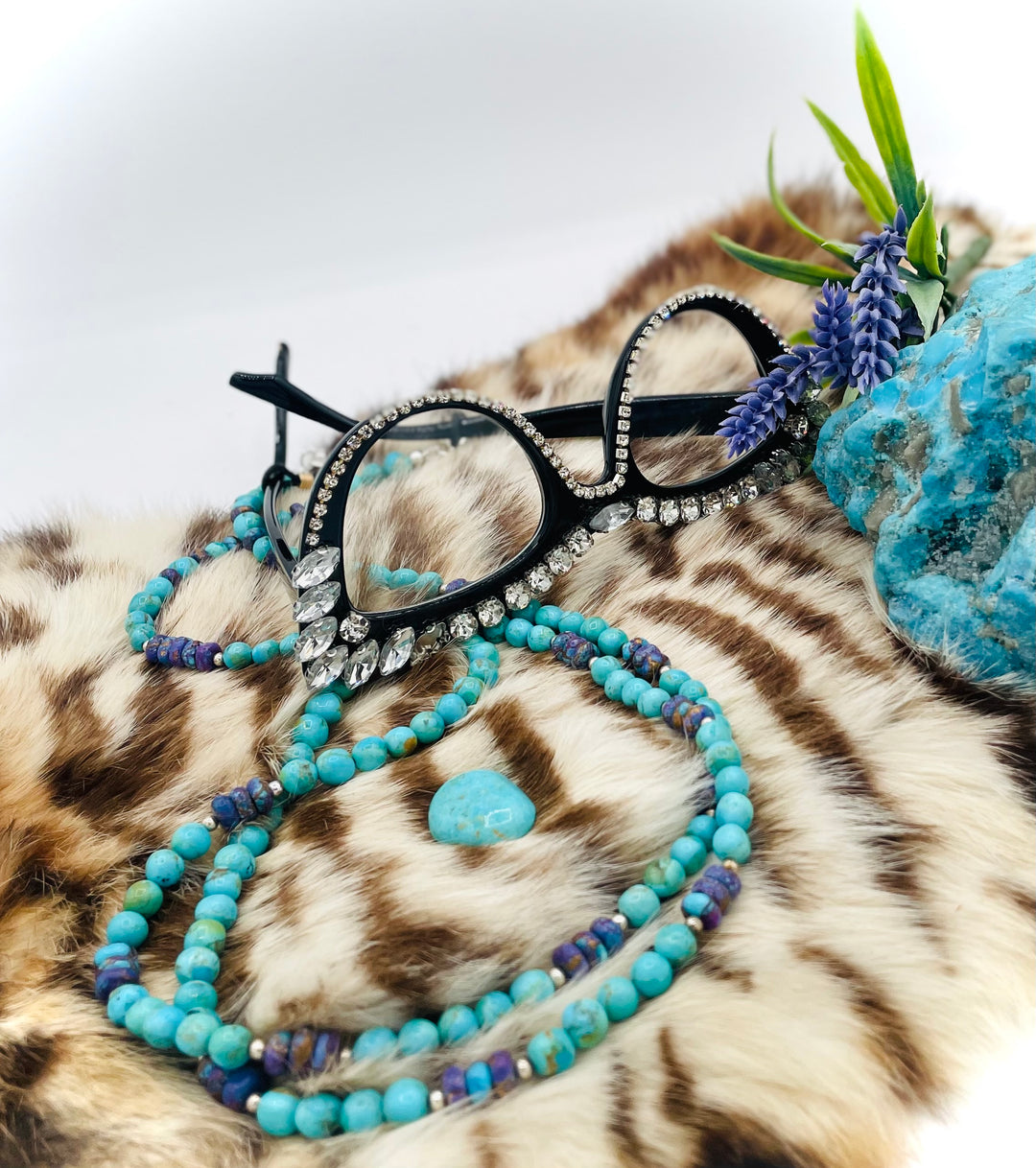Beaded invention necklace featuring Kingman turquoise, purple Mojave turquoise, sterling silver beads, sterling silver swivel lobsters, eye glasses loops, cell phone case attachment bracket. Available only from Rockstar Cowgirl online or in store in Cody, Wyoming.