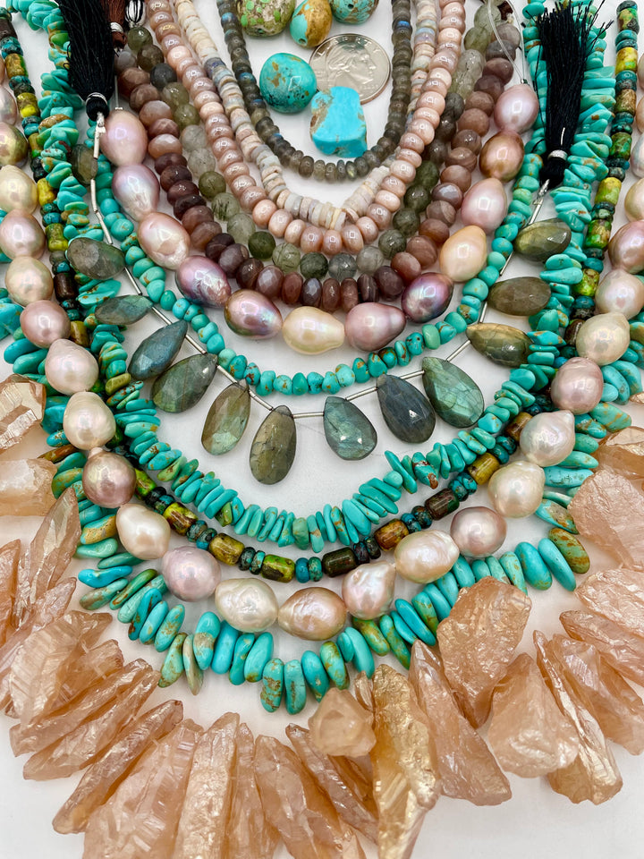 Curated bead box featuring Sonoran turquoise, Kingman turquoise, Hubei turquoise, #8 turquoise, high grade pearls, labradorite, quartz, and moonstone.  143 grams of turquoise. Includes strands and pendent sized nuggets. U.S. quarter for size reference. Available only from Rockstar Cowgirl online or in store in Cody, Wyoming.