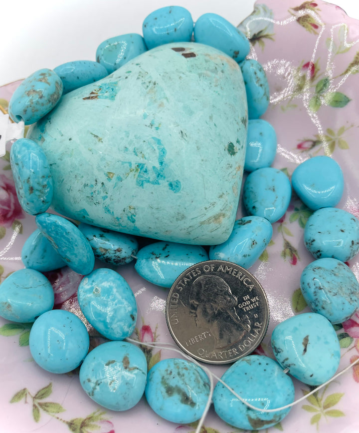 Campitos turquoise nuggets 16 inch bead strand. U.S. quarter for size reference. Available only from Rockstar Cowgirl online or in store in Cody, Wyoming.