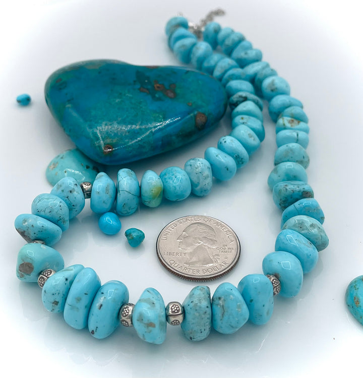 Handmade beaded necklace featuring Campitos center drilled turquoise nuggets and sterling silver beads. U.S. quarter for size reference. Available only from Rockstar Cowgirl online or in store in Cody, Wyoming.