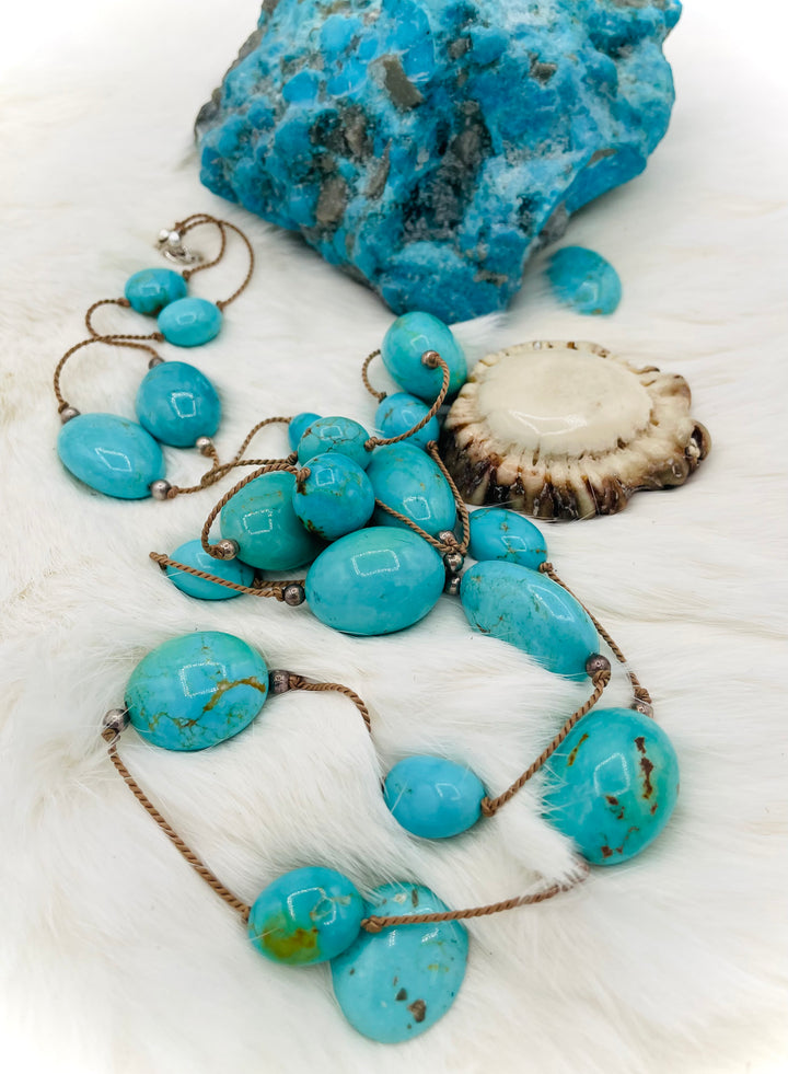 Silk knotted necklace featuring Kingman turquoise nuggets and sterling silver rounds on silk cord. Available only from Rockstar Cowgirl online or in store in Cody, Wyoming.