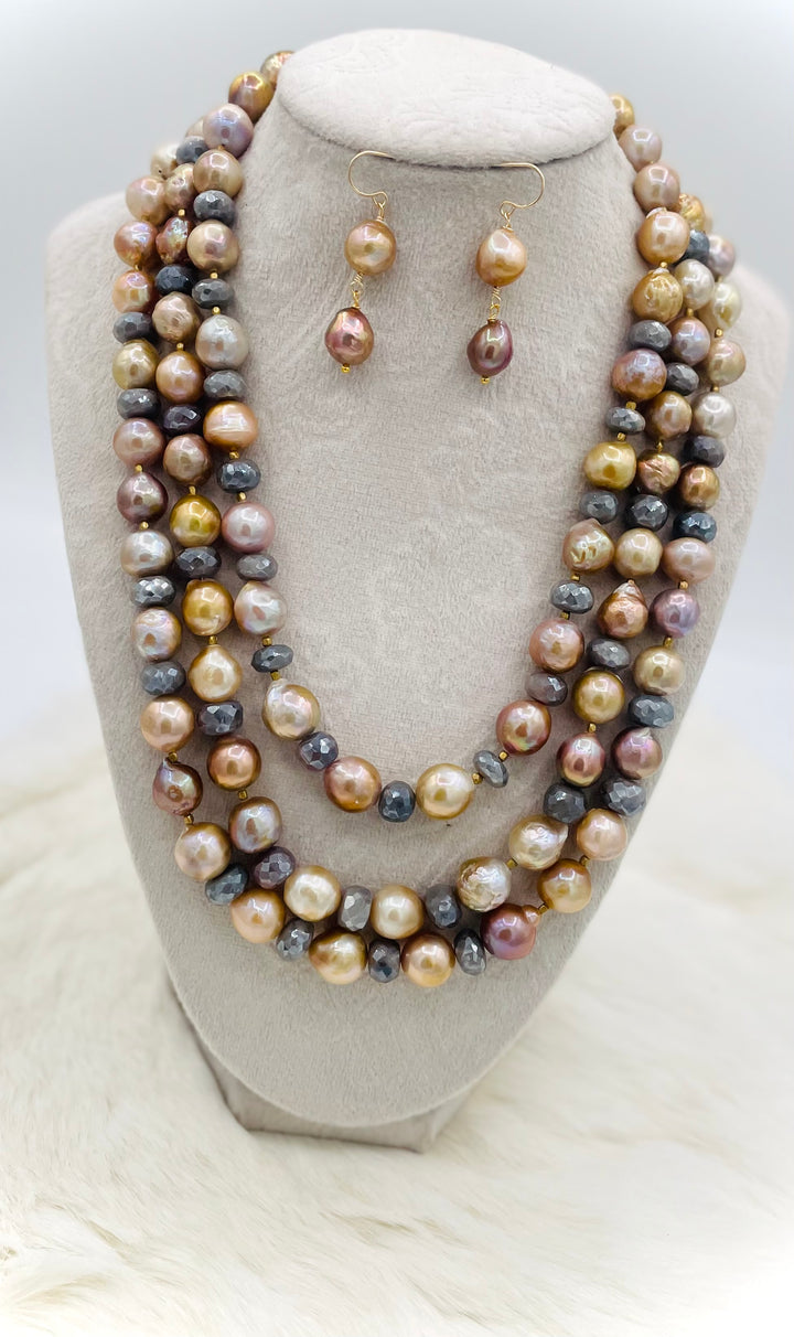 Beaded 2 strand necklace featuring natural luster pearls, grey silverite, and bronze accents with matching earrings. Available only from Rockstar Cowgirl online or in store in Cody, Wyoming.