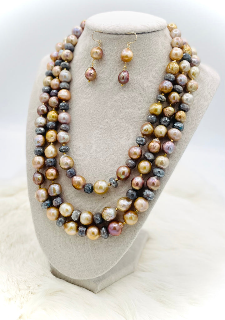 Beaded 2 strand necklace featuring natural luster pearls, grey silverite, and bronze accents with matching earrings. Available only from Rockstar Cowgirl online or in store in Cody, Wyoming.