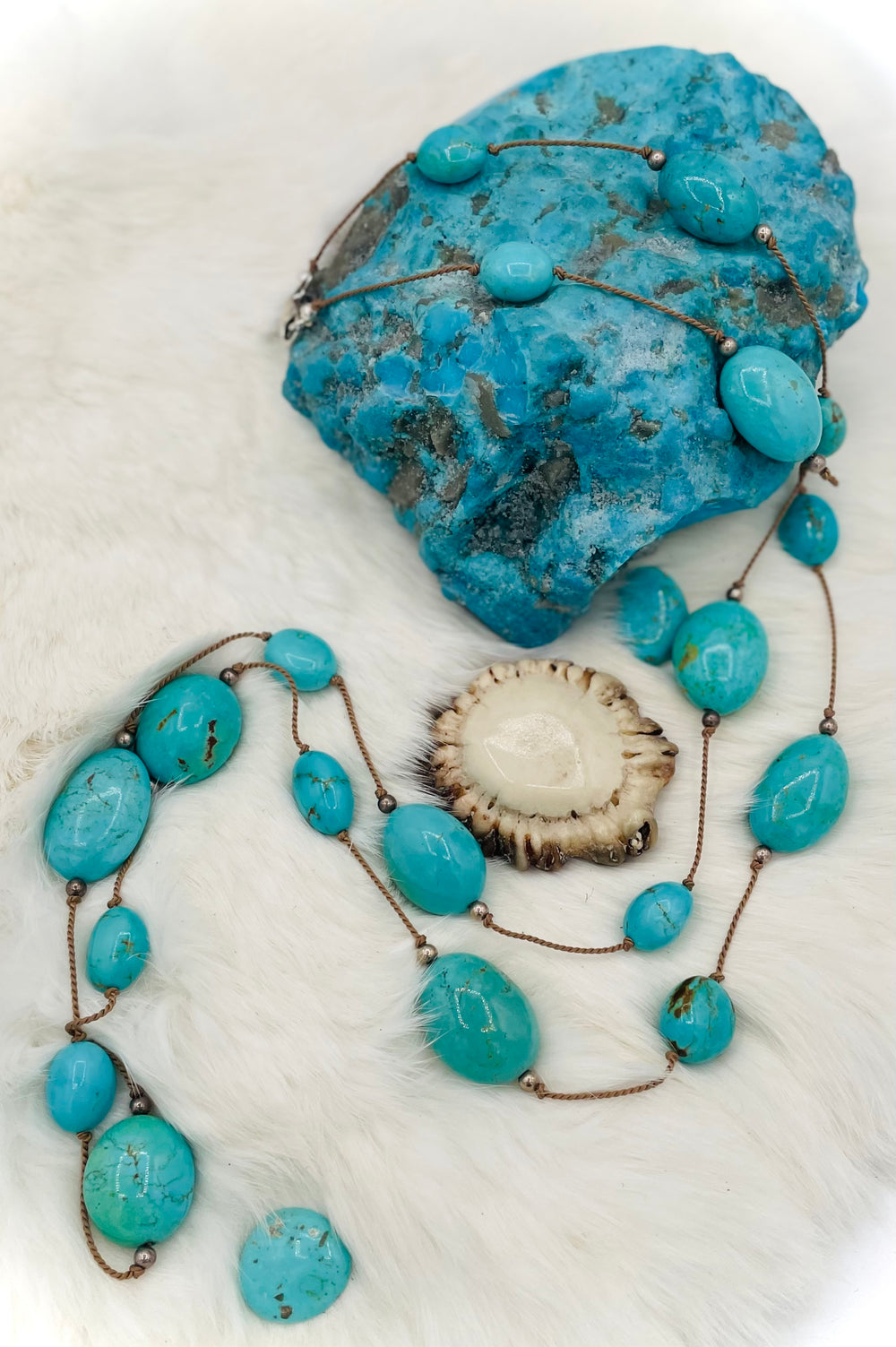 Silk knotted necklace featuring Kingman turquoise nuggets and sterling silver rounds on silk cord. Available only from Rockstar Cowgirl online or in store in Cody, Wyoming.