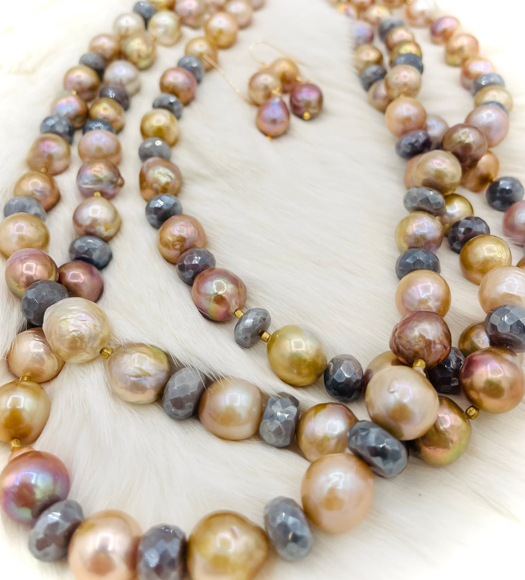 Beaded 2 strand necklace featuring natural luster pearls, grey silverite, and bronze accents with matching earrings. Available only from Rockstar Cowgirl online or in store in Cody, Wyoming.
