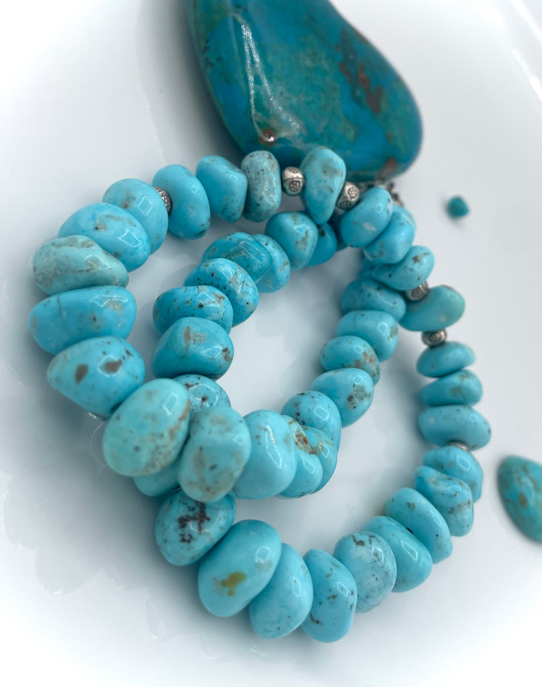 Handmade beaded necklace featuring Campitos center drilled turquoise nuggets and sterling silver beads. Available only from Rockstar Cowgirl online or in store in Cody, Wyoming.